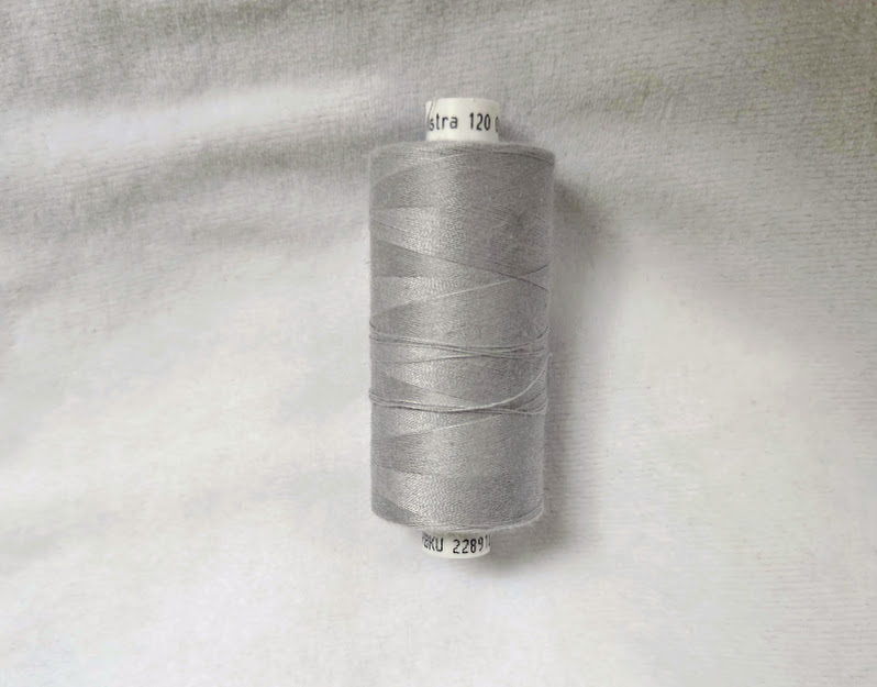 coast Astra tråd, polyester lys grå no. 09138