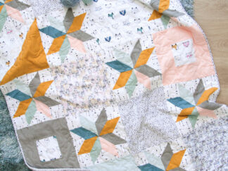 Baby quilt Cuddles & cones - flot babylegetæppe - Sy selv dette legetæppe efter det gratis mønster du kan downloade. Lav det skønneste bløde tæppe til baby
